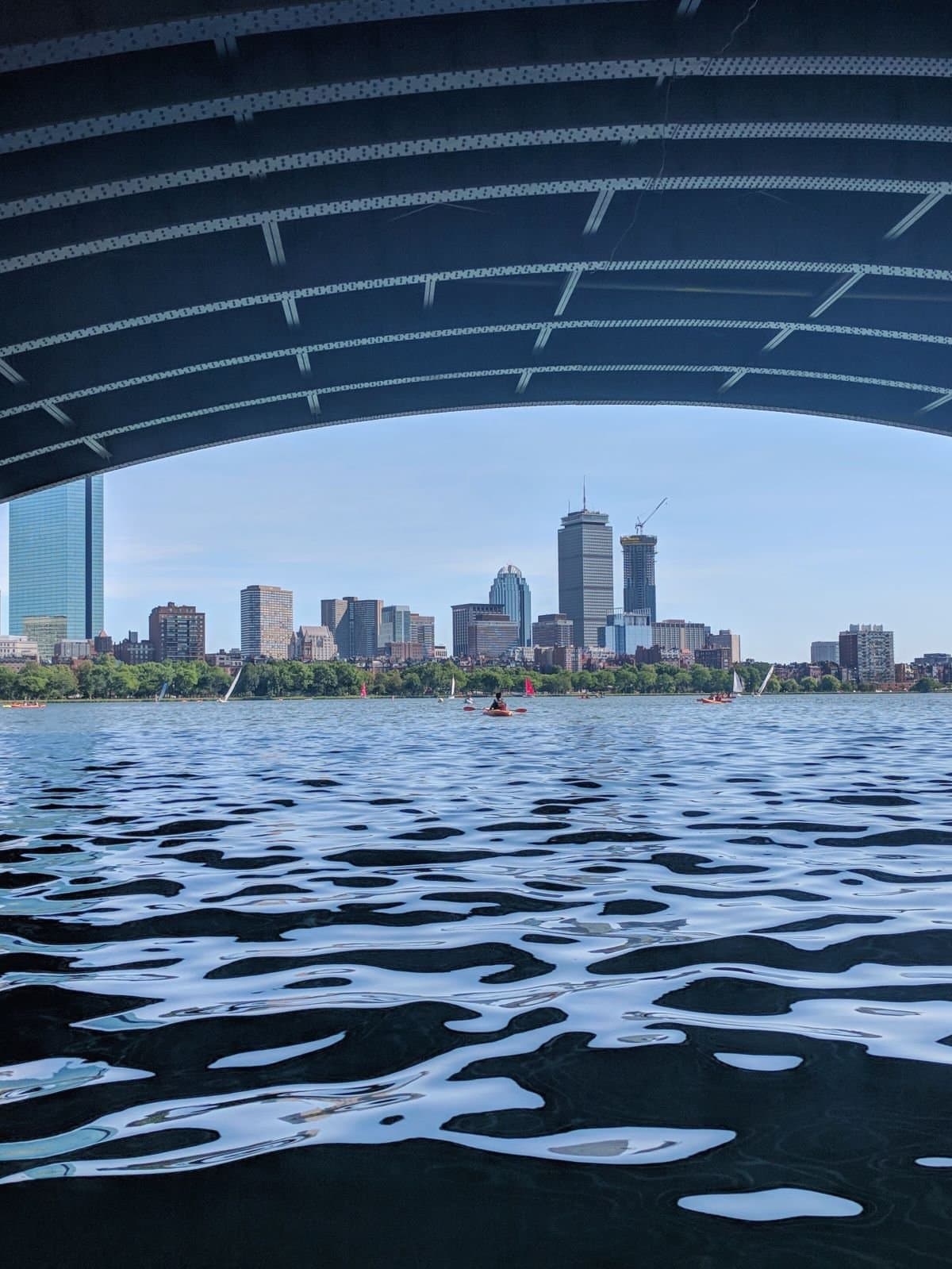 Boston skyline from a kayak in the Charles River